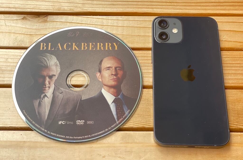 Photo of BlackBerry DVD & iPhone.